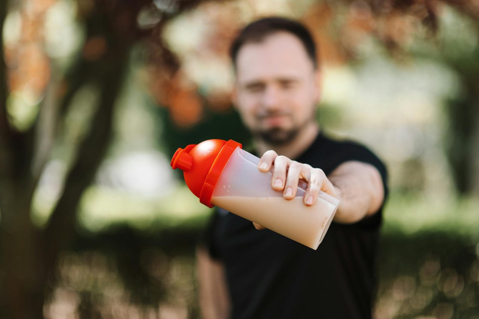 https://www.pexels.com/photo/a-plastic-tumbler-with-drink-on-a-man-s-hand-4378525/